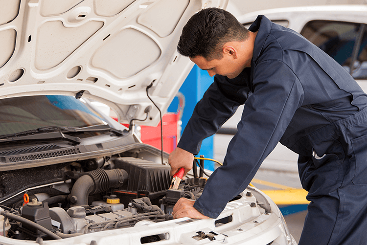 Mechanic working on a car